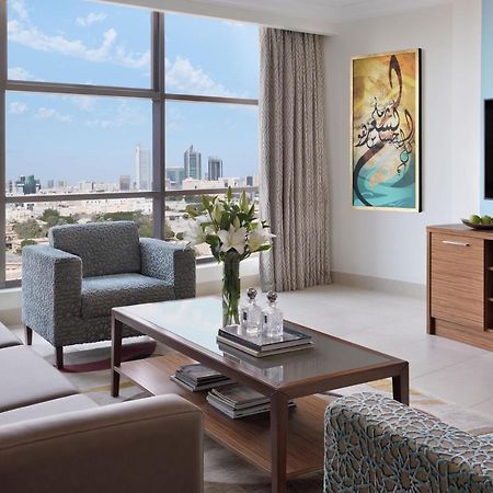 Marriott Executive Apartments Al-Khobar Eksteriør bilde A living room in a typical apartment