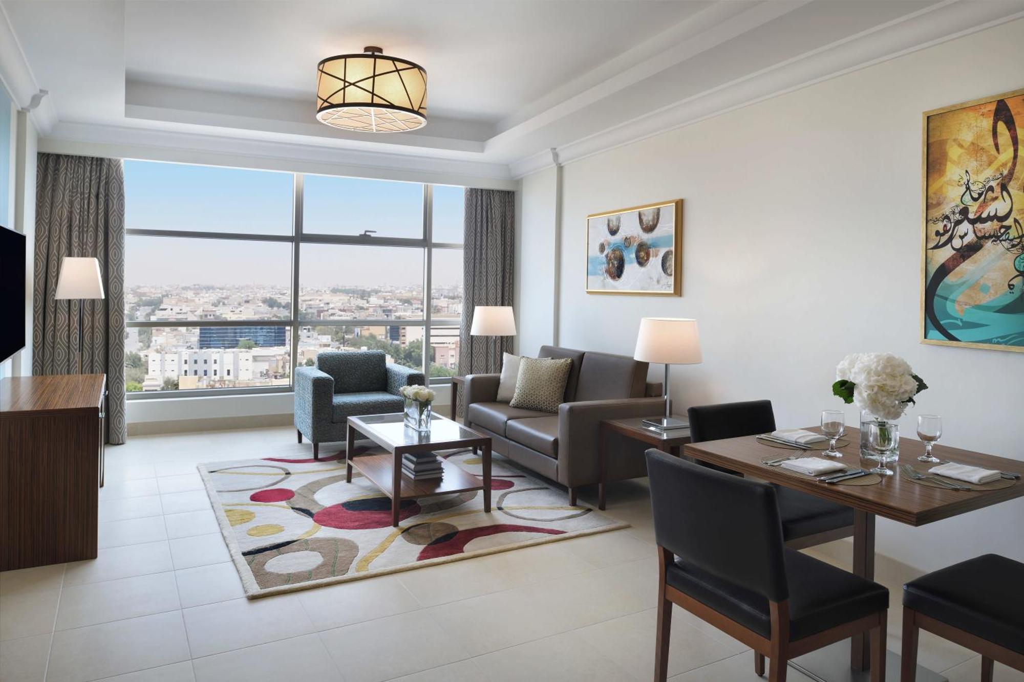 Marriott Executive Apartments Al-Khobar Eksteriør bilde A living room at the hotel